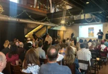 NEW’s Second Annual #910 Day Packs Ironclad Brewing In Wilmington Jim Roberts of NEW welcomes the crowd to the second annual #910 Day at Ironclad Brewing.