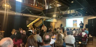 NEW’s Second Annual #910 Day Packs Ironclad Brewing In Wilmington Jim Roberts of NEW welcomes the crowd to the second annual #910 Day at Ironclad Brewing.